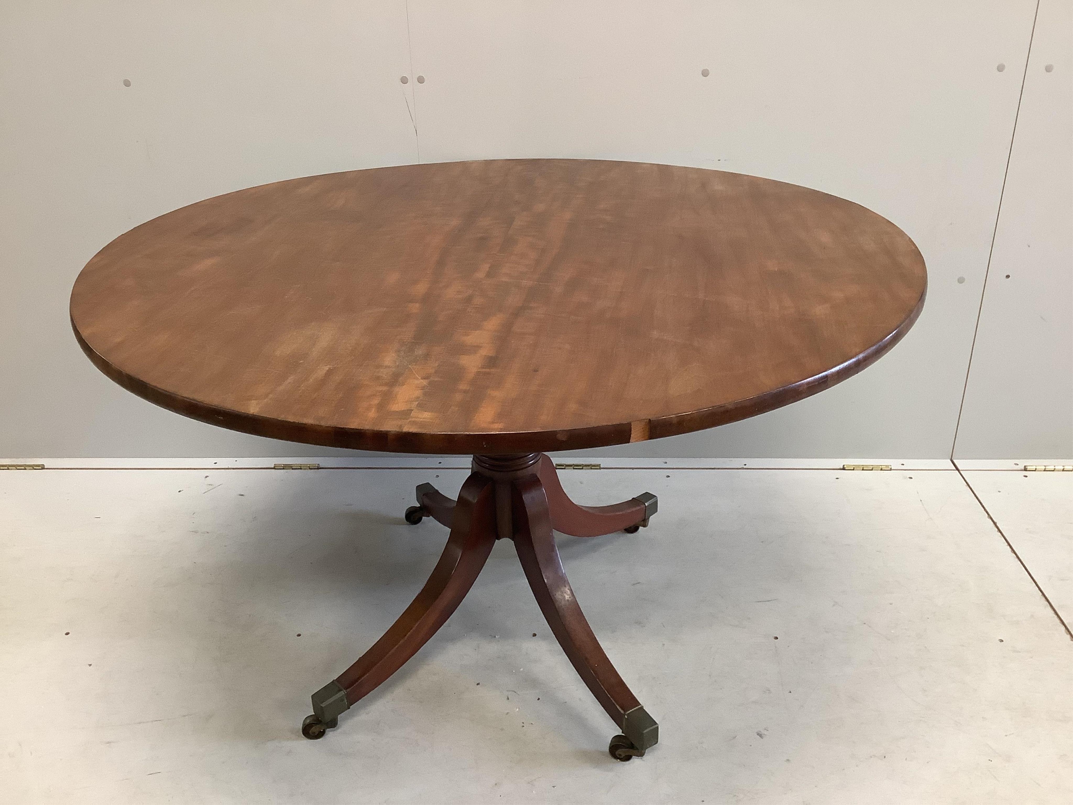 A George III circular mahogany tilt top breakfast table, diameter 120cm, height 71cm. Condition - fair to good